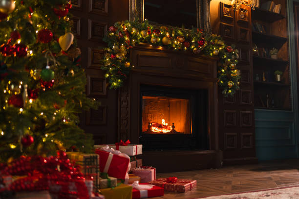 istock Classical Christmas decorated interior living room library with fireplace. Christmas tree with red golden ornament decorations. Modern classic style interior design apartment. Christmas eve at home. 1784876420