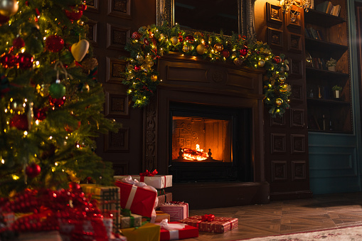 Digitally generated Christmas decorated warm and cozy home interior.\n\nThe scene was rendered with photorealistic shaders and lighting in Autodesk® 3ds Max 2020 with V-Ray 5 with some post-production added.