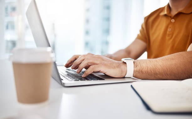 istock Hands typing, laptop and business man for data analytics, research or writing on web for seo job. Businessman, computer and website management in startup office with analysis, report or communication 1784879765