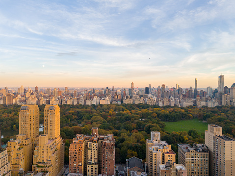 Aerial photo New York Central Park. View of highrise condominium buildings and fall foliage