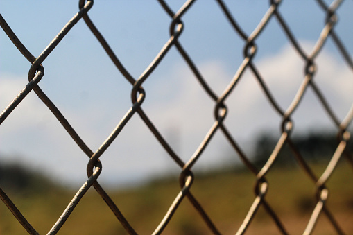 Wire fences are often used to divide houses or roads