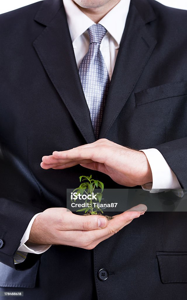 Homem proteger uma planta na Mão - Royalty-free Aberto Foto de stock