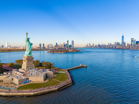 Statue of Liberty in New York with the city skyline in the background.