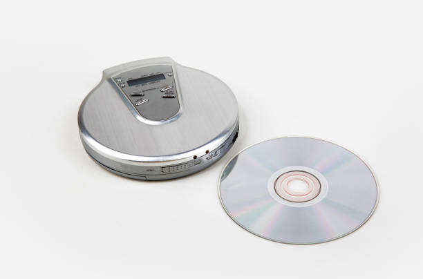 Portable Compact Disk Player Open Portable Compact Disk Player with CD isolated on white background open cd player stock pictures, royalty-free photos & images