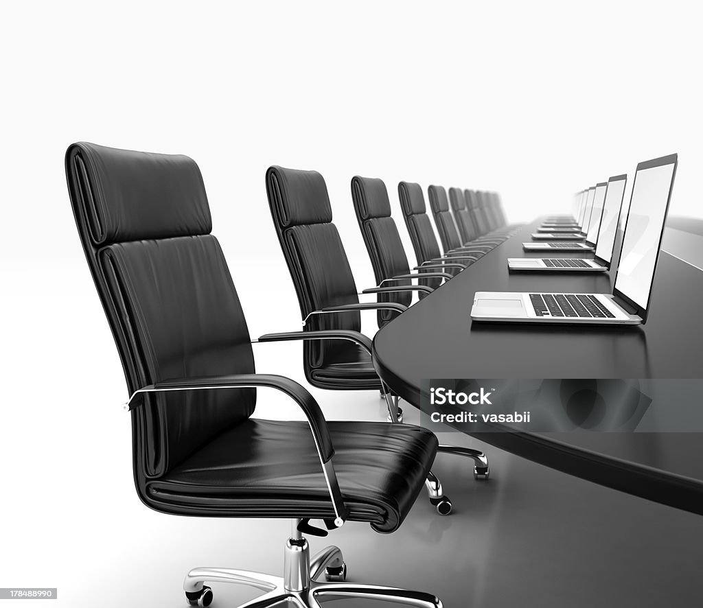 Meeting room 3D render of conference room with black table black leather chairs and laptops Armchair Stock Photo