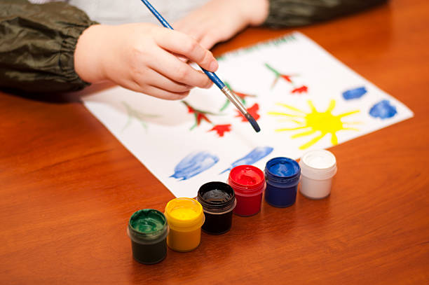 istock Child draws a picture paints 178489802