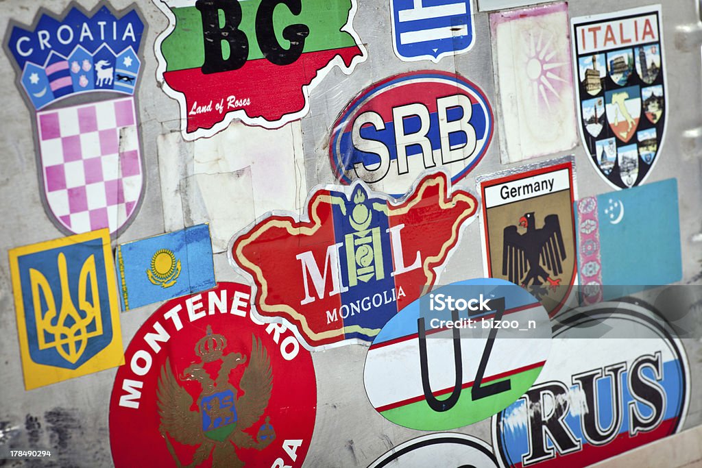 Country stickers Country abbreviations stickers on a metal suitcase Abbreviation Stock Photo