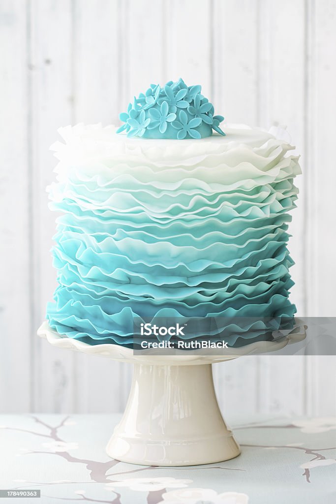 Ombre ruffle cake Ombre ruffle cake in shades of blueMore from my portfolio - Cake Stock Photo