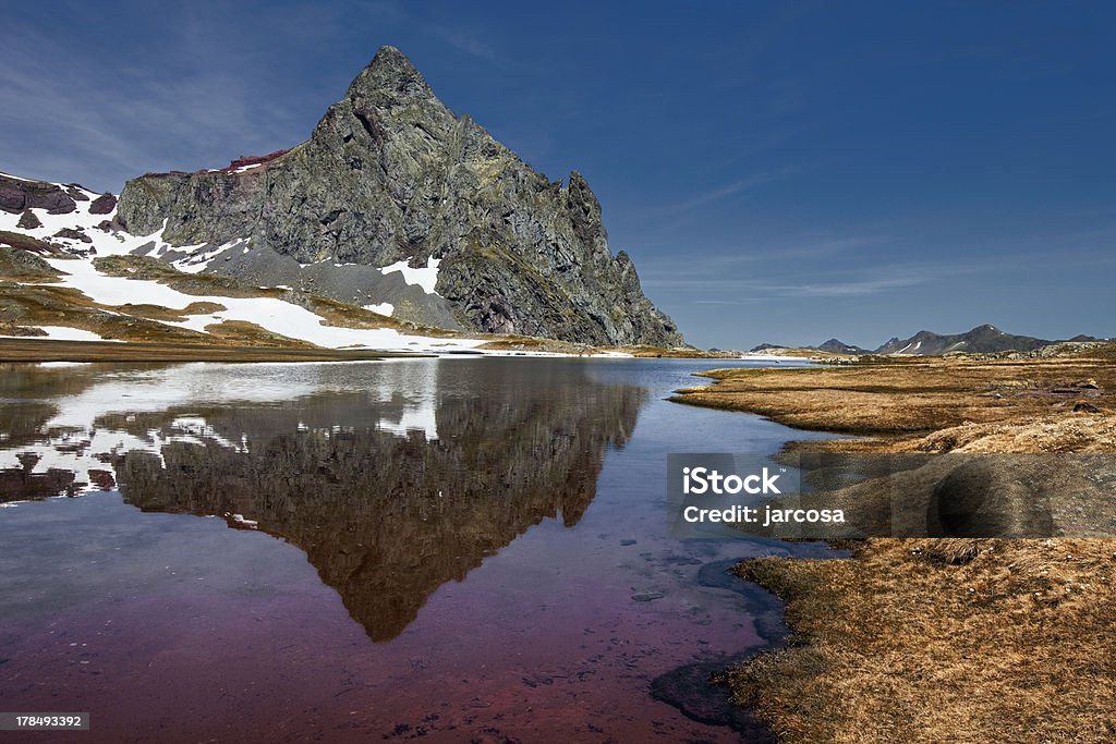 Reflections Anayet peak in the aragoneses Pyrenees "Reflections Anayet peak in the aragoneses Pyrenees, Tena Valley" Circus Stock Photo