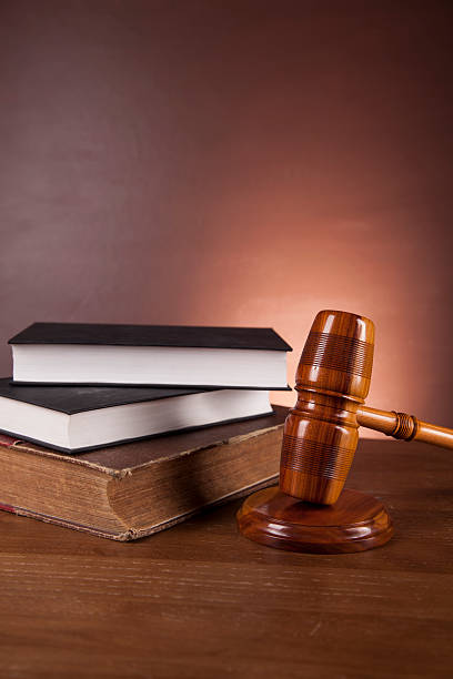 istock Law concept with wooden table and dark background 178493898