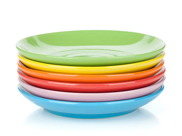 satz von bunte untertassen - plate dishware stack multi colored stock-fotos und bilder