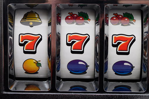 Slot machine and jackpot three seven