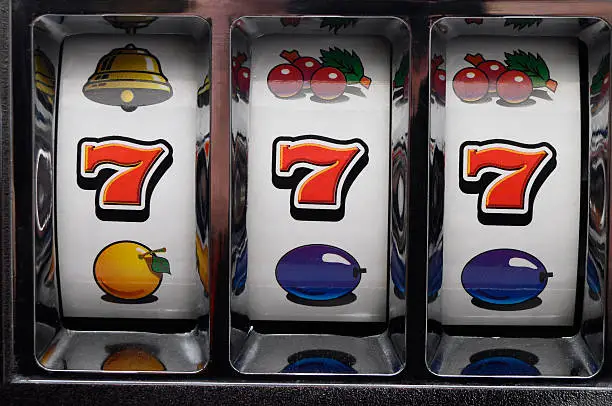 Slot machine and jackpot three seven