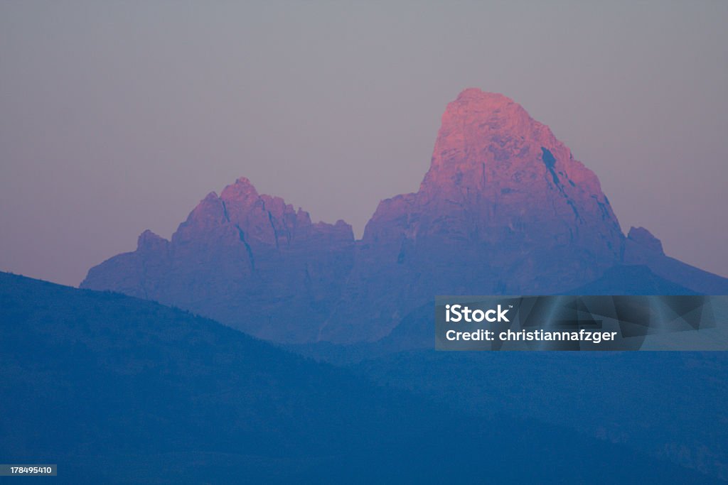 Cimes ensoleillées sur le Grand Teton - Photo de Cimes ensoleillées libre de droits