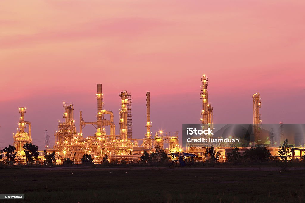 Oil refinery at twilight Air Pollution Stock Photo