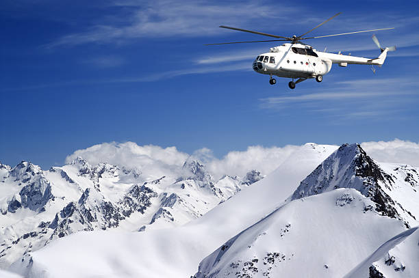 istock Helicopter in winter mountains 178495678