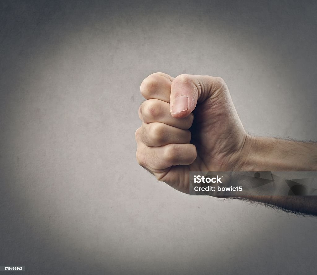 fist hand holding a fist Adult Stock Photo