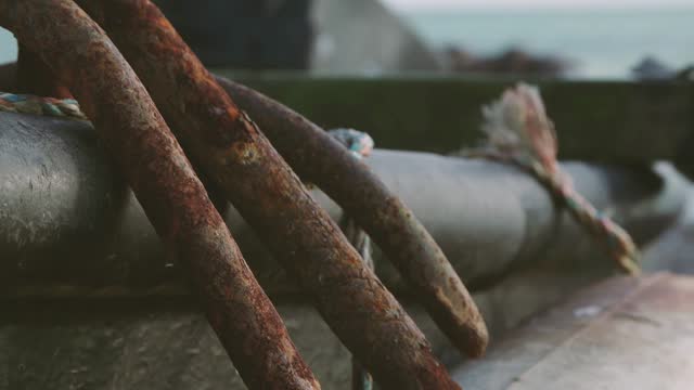 Old rusty structure by the sea. Slow motion stock video