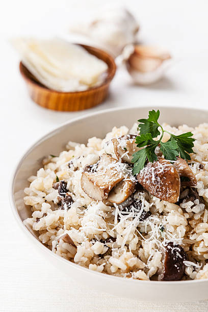 istock Wild mushroom risotto dish with bowl 178496478