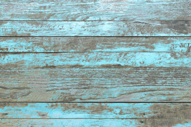 istock Wall of blue color wood texture background surface with old natural pattern or cracks wood table top view. Grunge surface with wooden planks texture background. Vintage timber texture rustic design. 1784986852