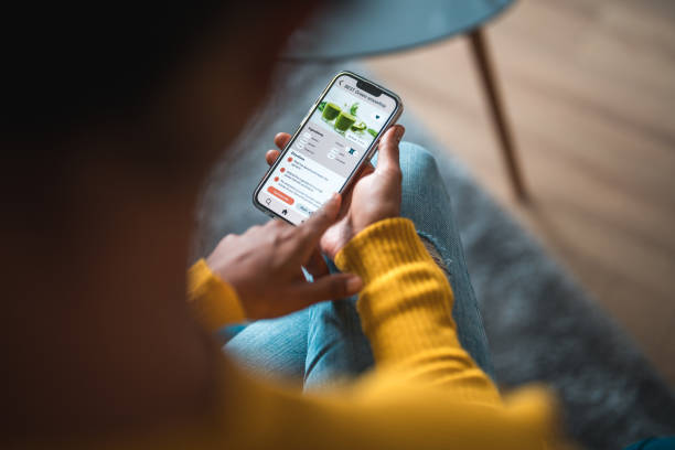 istock Nutritionist and Client Explore Fitness App for Active Lifestyle 1784987709