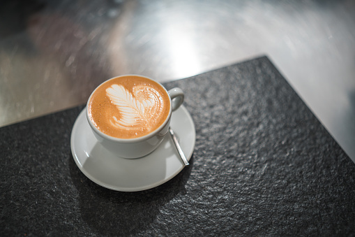 Step into a world of latte art extravaganza as the coffee cups in the coffee house mesmerize with their mesmerizing designs, making your coffee moments truly exceptional.