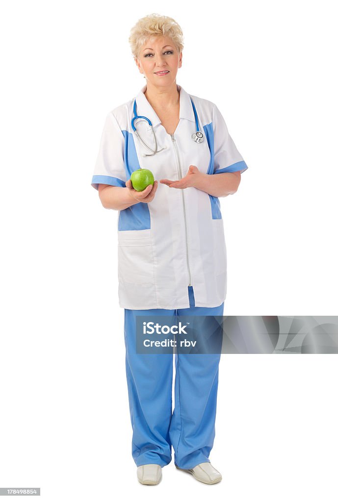 Maduro médico com Maçã - Royalty-free 50 Anos Foto de stock