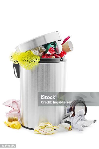 Overflowing Stainless Steel Trash Can Stock Photo - Download Image Now - Garbage Can, White Background, Full