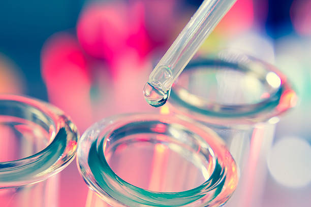 Close up view of Test Tubes on blue stock photo