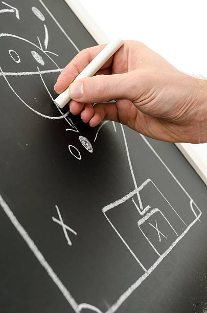 istock Hand writing a fotball strategy 178499190