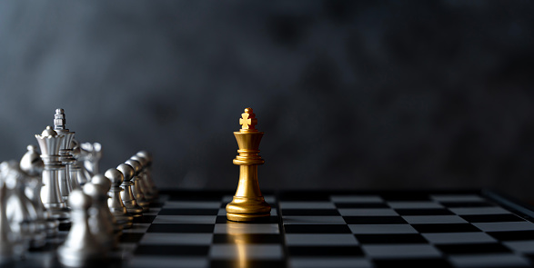 One Chess Piece is with a full set of chess strategy, planning and decision making concepts. Chess strategic business plan on businesspeople background