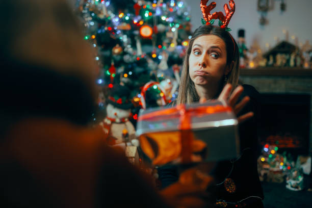 istock Ungrateful Woman Refusing a Christmas Gift from a Friend 1785000271
