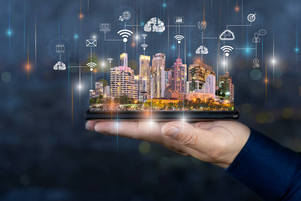 istock Smart city technologies concept with digital tablet and night megapolis city skyscrapers with digital cloud icons on human hand. 1785004127