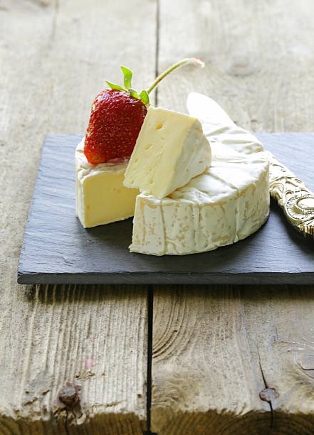 istock round piece of soft cheese (brie, camembert) 178500428