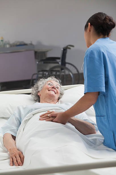 istock Nurse taking care of an elderly patient 178501602
