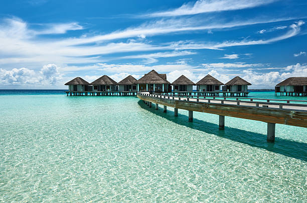 istock Beautiful beach with water bungalows 178501747