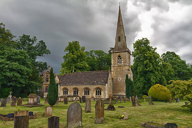 Picturesque old church in Duntisbourne Abbotts, an idyllic Cotswold village, Gloucestershire, UK