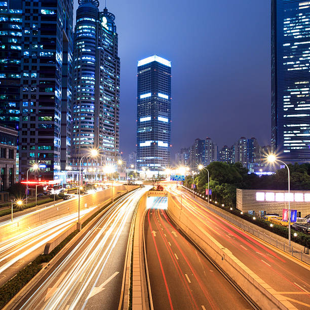 istock light trails on shanghai financial center at night 178503045