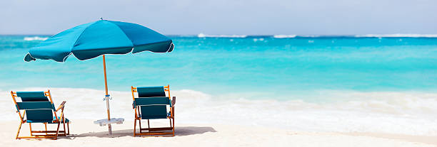 istock Chairs and umbrella on tropical beach 178503671