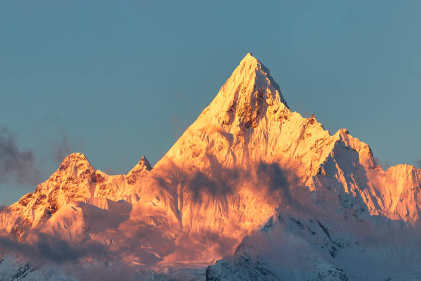 Sunrise over Meili Snow Mountain in Yunnan, China Sunrise over Meili Snow Mountain in Yunnan, China meili stock pictures, royalty-free photos & images