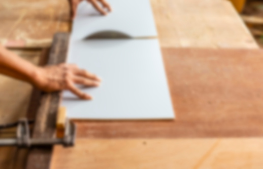 Blurred images of working in the woodworking industry