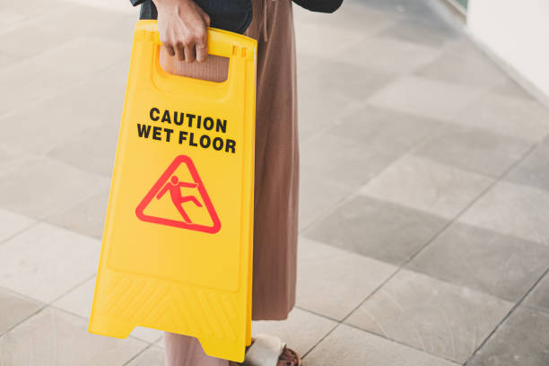 istock cleaning in progress sign on yellow plastic board on floor 1785038161