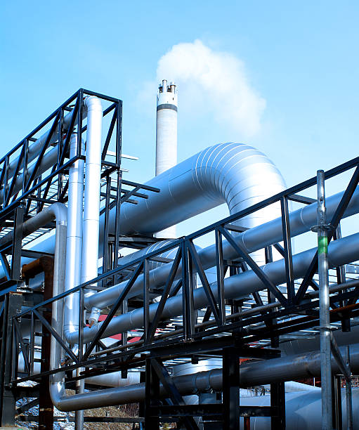 istock industrial pipelines and smokestack 178504701