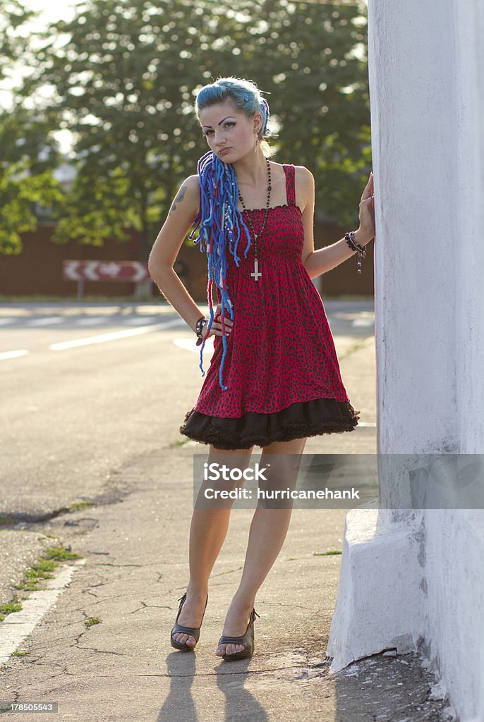 Fashionable manga girl at sunset Attractive young punk girl posing outdoors at sunset Adult Stock Photo