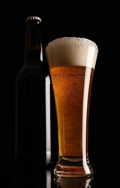 istock Bottle and glass with beer. 178505732