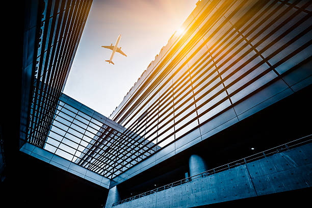 istock airplane fly above city 178506298