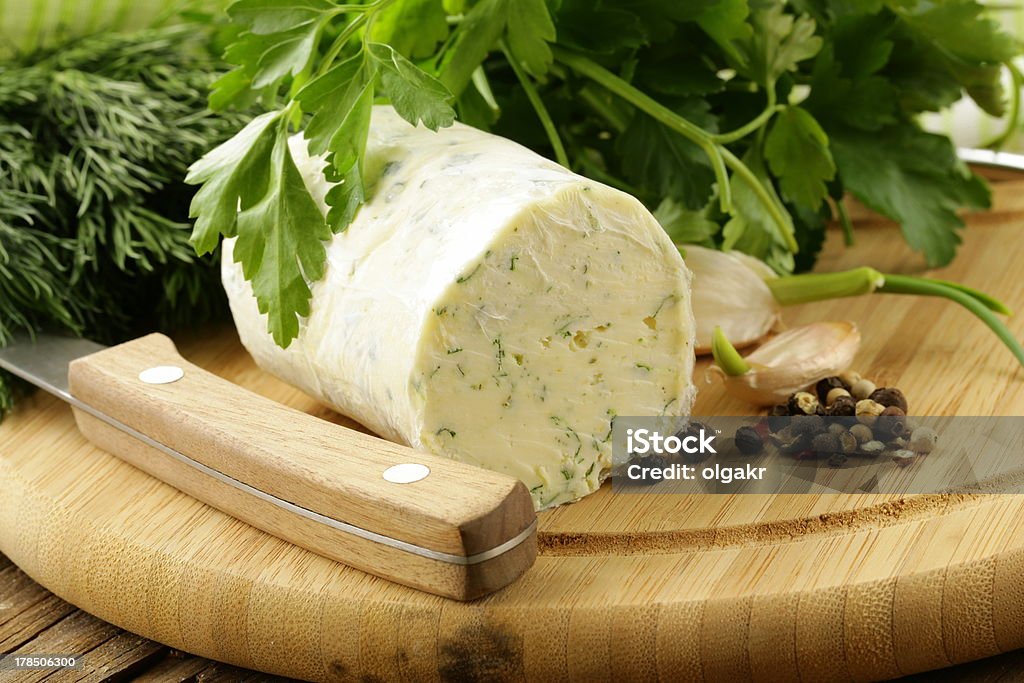 butter flavored with herbs and spices Butter Stock Photo