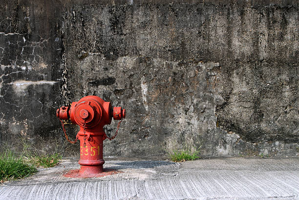 Red Hydrant on the road stock photo