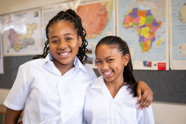 istock Two schoolgirls posing for a photograph 1785067072