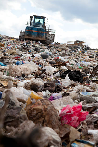 istock Landfill truck moving garbage 178507435